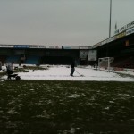 Fans clearing the Glanford Park pitch last season